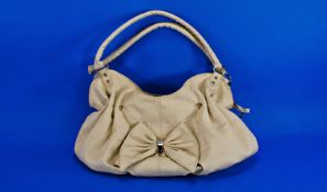 Cream Chanel Style Handbag, soft slouch style gathered into oval base, double, padded handles