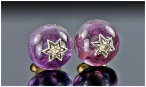 18ct Gold Stud Earrings, Both Mounted With Amethyst Coloured Cabochons With Central Star Set Rose