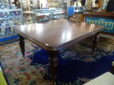 Early 20th Century Large Extending Mahogany Dining Table, circa 1912, with a windout mechanism,