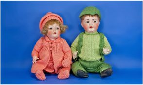 Bisque Head Girl and Boy Toddler Dolls, the boy by Simon & Halbig, no.126 50, blue sleeping eyes,