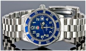 Tag Professional Ladies Sports Watch. Model number WM 1313. Blue dial, 2000 series, with box and