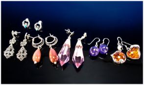 Six Pairs Of Silver Mounted Drop Earrings