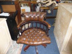 Mahogany Leather Captains Chair, deep buttoned seat and back, swivelling, raised on a five legs