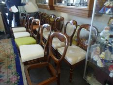 Set of Twelve Balloon Back Mahogany Dining Chairs, in the Victorian style, possibly early to mid