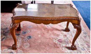 Serpentine Shaped Coffee Table, walnut finish, glass topped, raised on acanthus moulded cabriole