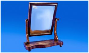 Mahogany Dressing Table Mirror, tilting action, with serpentine base, measuring 23 inches high.