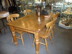 20th Century Pine Kitchen Table, with four associated beech chairs, table 29½ inches high, 60 wide