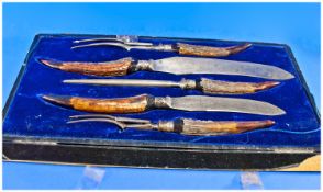 A Five Piece Cased Horn Mounted Carving Set, the steel blades and forks by James Meakin & Sons,