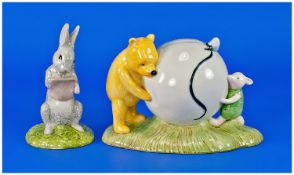Royal Doulton Winnie The Pooh Collection. 1) Blue balloon money box. 2) Rabbit reads the plan.
