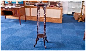 Modern Mahogany Plant Stand, of two tier form, raised on barley twist legs, measuring 41 inches