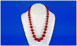 A Good Quality Natural Coral Bead Graduating Necklace, orange/red colour. 20`` in length. 62.2