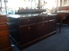 Modern Stag Mahogany Side Unit, of two sections, each side fitted with three drawers over three