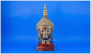 Large Brass Buddha Head on wooden base, Heavy cast, encrusted with paste jewels. 18`` in height.