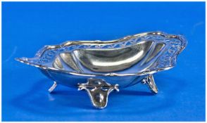 An Arts and Crafts Edwardian Silver Bon-Bon Dish. Lobed shape with pierced frieze and ribbon