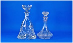 Cut Glass Decanter, with stopper together with a pressed glass decanter, 12 inches high, (2).