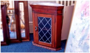 Small 20th Century Corner Cupboard, fitted with single door.