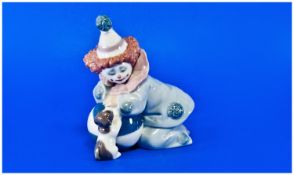 Lladro Figure, `Pierrot with Puppy & Ball`, model number 5278, issued 1985, 4.25 inches high, first