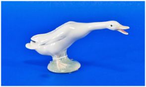 Lladro Figure `Honking Goose` model number 4551, measuring 3½ inches high.