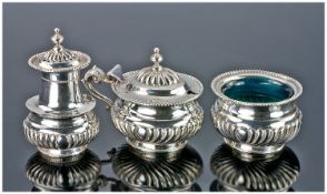 A Good Silver Condiment Set (Salt, Pepper & Mustard Pot) of semi-gadrooned  and beaded pattern.