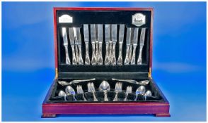 Harrods Fine Quality Guy Degrenne 60 piece cutlery set housed within a  mahogany case. Mint/As new