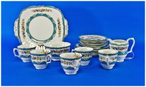 Crown Staffordshire Part Tea Set, all decorated with floral spray bands and blue borders,