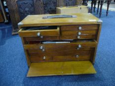 Early 20th Century Tool Chest, the removable cover opening to reveal eight drawers, comprising a