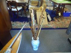 Modern Vase Together With 8 Walking Sticks.