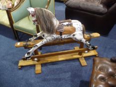 Early 20th Century Rocking Horse, the white painted horse with amber coloured glass eyes, raised on