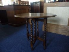 Early 20th Century Folding Oak Occasional Table, with cross-frame, gates closing and allowing table