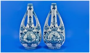 Delft Pair of Two Handle Blue and White Vases, decorated with images of sailing ships and