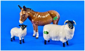Three Beswick Animal Figures, comprising 2 sheep and one foal.