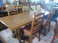 Modern Solid Oak and Elm Dining Table and Four Oak Chairs, the table with a solid oak top and