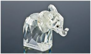 Swarovski Crystal Figure, Elephant with metal tail. 2.25`` in height. Mint condition.