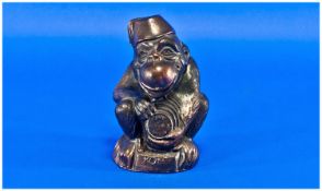 A Spelter Metal Copperized Money Bank, made during the 1939/1945 War, in the shape of a monkey
