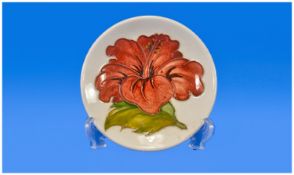Moorcroft Pin Dish `Coral Hibiscus` Design On Green Ground. 5 inch diameter.
