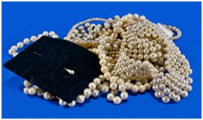 Collection Of 7 Simulated Pearl Necklaces. Various Lengths. Together With A Simulated Pearl Stick
