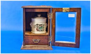 Early 20th Century Oak Smokers Cabinet, retaining ceramic tobacco jar, single drawer below,