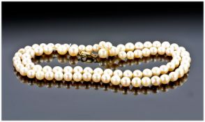 A Good Quality Cultured Single Strand Pearl Necklace, with 9ct gold clasp. Well matched and of good