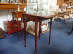 George III Mahogany Pembroke Table, circa 1795, with two leaves, each finished with fine boxwood