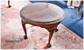 Circular Mahogany Coffee Table, raised on heavy cabriole legs.