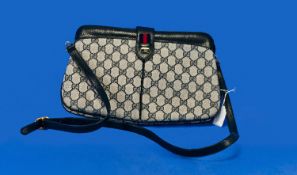 Ladies Grey/Blue and Navy Shoulder Bag, Gucci logo printed  grey/blue body in 4 panels, divided by