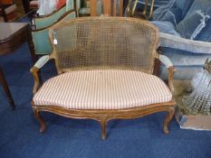19th Century Beechwood Sofa, in the French taste English, fitted with canework to back and seat,