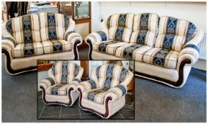 Classic Four Piece Suite, upholstered in a cream and blue floral striped fabric, comprising three