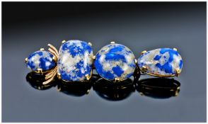 Lapis Lazuli Mounted Brooch, Set With Four Large Polished Stones In A Yellow Metal Unmarked Mount.