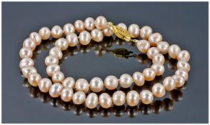 Pink Pearl Cultured Necklace. Length 17 Inches