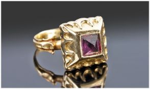 Continental High Carat Gold Amethyst Set Ring, Square Setting Moulded Edge With Fleur De Lys Style