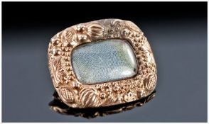 19thC Yellow Metal Mourning Brooch, With Glazed Front, Chased Floral Border. 19x22mm