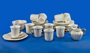 Shelley China Part Tea Set, comprising 11 cups, 11 saucers, 12 side plates, milk jug and sugar
