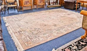 Large Chinese Style Room Size Woolen Rug, decorated with floral foliage on a peach ground, with