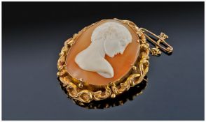 Very Fine Victorian Shell Cameo Within a Gold Ornate Mount with safety chain. Not marked but tests